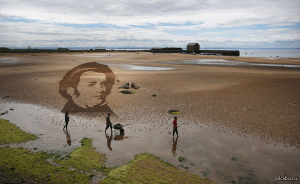 Портрет на песке .