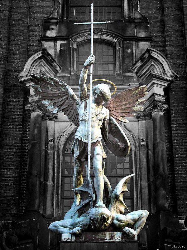 Archangel Michaels victory over the Devil, sculpture above the main entrance at St. Michaelis Church, Hamburg 
