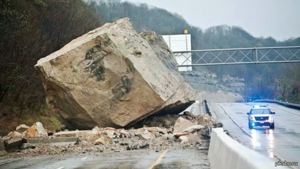 A huge stone fell from the mountain onto the highway - USA, Boulder, A rock, Road