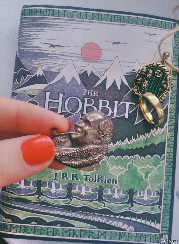 J.R.R. Tolkien       )