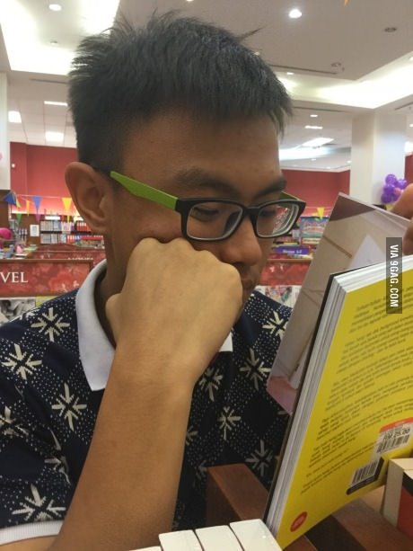 I can't figure out if he's sleeping or reading? - Asians, Books, Unclear, 9GAG