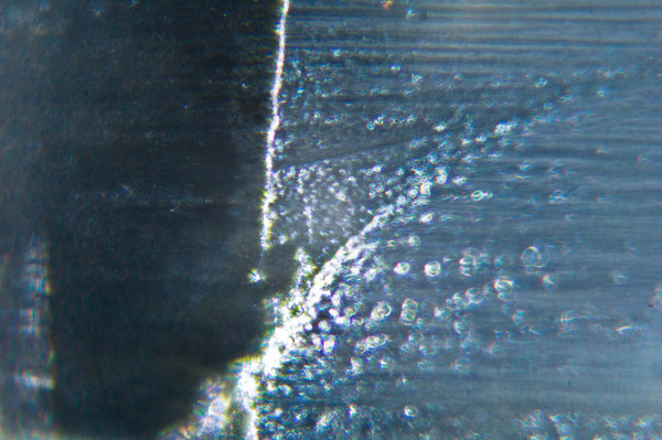 1450635038157430433 Как выглядит стекло под микроскопом